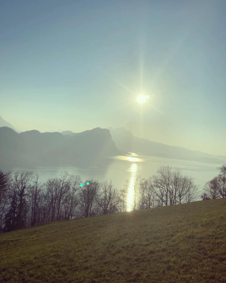 Photo by Hotel Rigi Kaltbad on March 22, 2022. May be an image of twilight, lake, nature and mountain.
