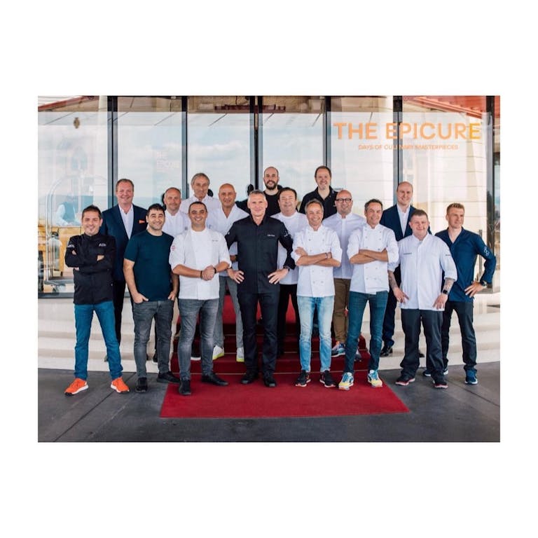 Photo shared by The Dolder Grand on July 11, 2022 tagging @prateeksadhu, @hermanostorres, @laurenteperon, @kaybaumgardt, @marco_mueller_rutz, @chef_julien, @chefpetergilmore, @smclchef, @heiko_nieder, @the_clumsies, @andreas_senn1980, @ferrantino.matteo, @rolfbeeler, and @david_martin_chef. May be an image of 8 people, people standing and indoor.
